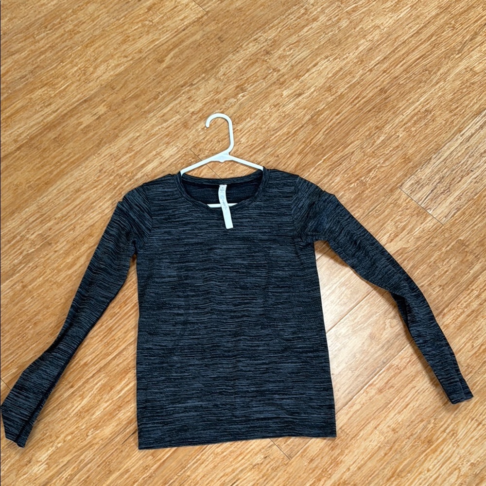 Swiftly Tech Long-Sleeve Shirt 2.0
Waist Length